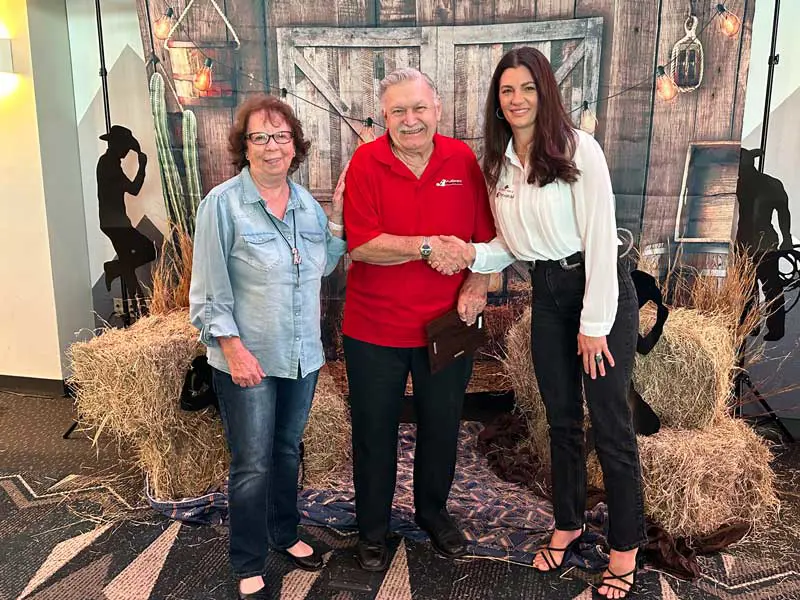 john shaking hands with ashley